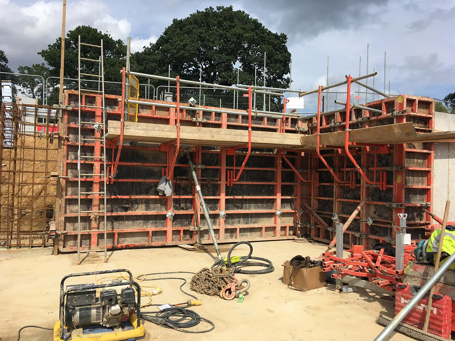 Temporary works design - scaffold covered walkway on a construction site